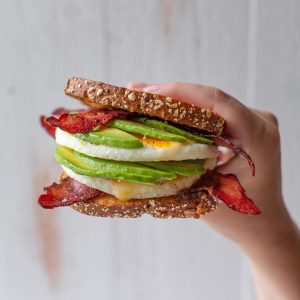 Bacon, Egg White Patty and Avocado Breakfast Sandwich